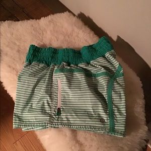 GREEN AND WHITE STRIPED LULULEMON SHORTS